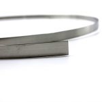 Close up view of a stainless steel strap.